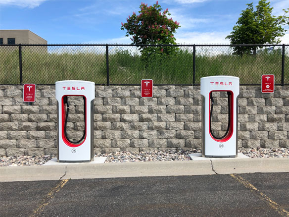 White and Red Tesla Charging Station